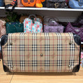 Burberrys duffle bag bottom with metal feet
