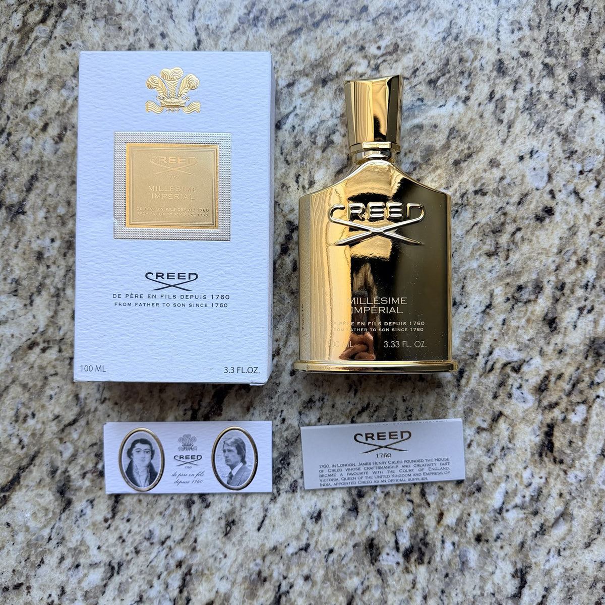Creed Millésime Impérial bottle with box and cards