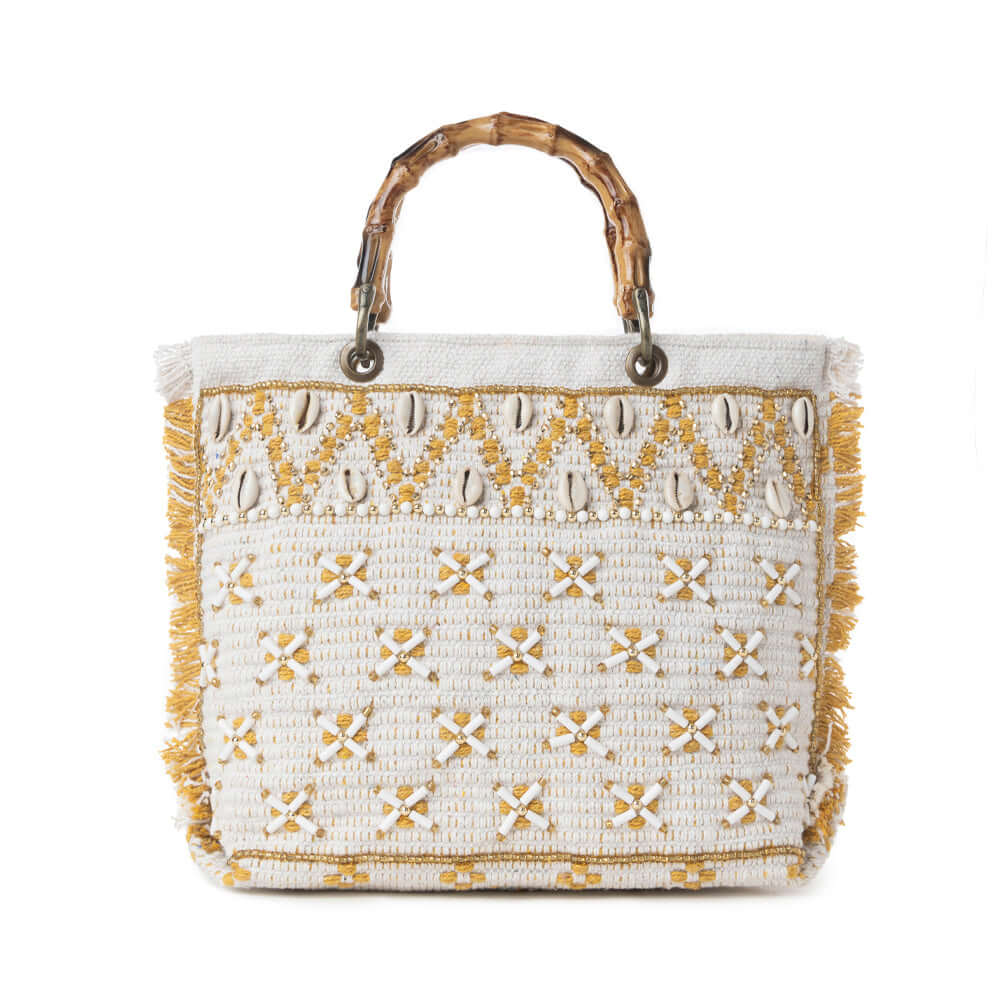 Myra Sunset Creek Embroidered Small Bag in Coastal White featuring decorative cowrie shells and intricate hand embroidery.
