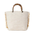 Myra Sunset Creek Embroidered Small Bag in Coastal White with bamboo handle and fringed details.