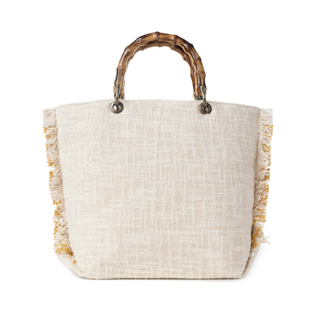 Myra Sunset Creek Embroidered Small Bag in Coastal White with bamboo handle and fringed details.