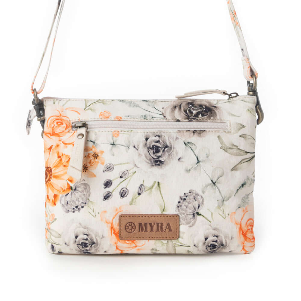 Myra Florabelle Crossbody Bag in Peach Summer with floral design and adjustable strap.