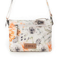 Myra Florabelle Crossbody Bag in Peach Summer with floral design and adjustable strap.