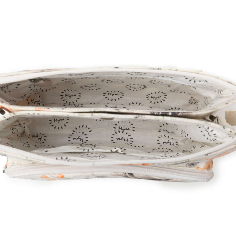Myra Florabelle Crossbody Bag in Peach Summer with floral design and adjustable strap.