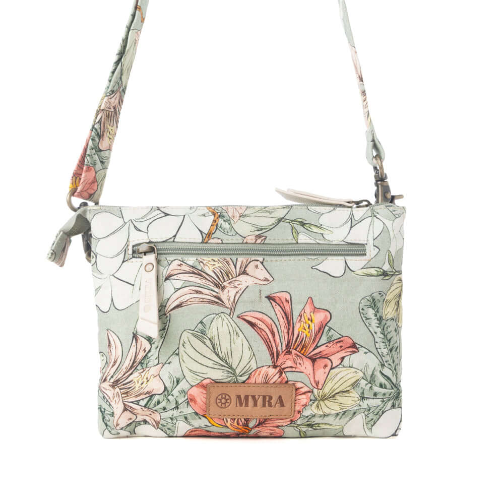 Myra Florabelle Crossbody Bag in Peach Summer featuring a floral design and adjustable strap.