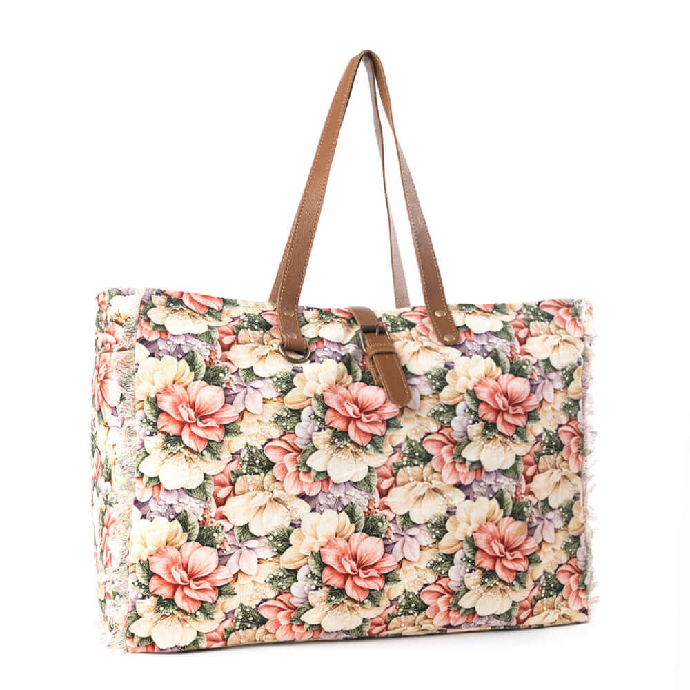 Myra Meadow Crest Weekender Bag in Floral Multi with vibrant floral print and spacious interior for travel.