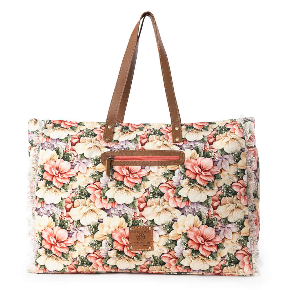 Myra Meadow Crest Weekender Bag in Floral Multi with vibrant floral print and spacious interior for travel.