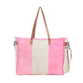 Myra Queen Creek Weekender Bag in Pink - Spacious Leather Travel Tote with Patchwork, Leather Handles, and Playful Retro Vibes.