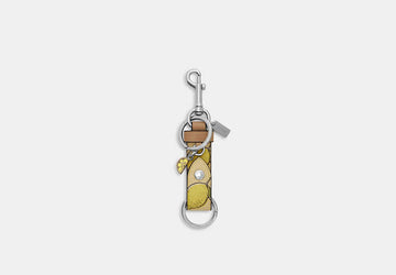 Coach Trigger Snap Bag Charm Key Fob Lemon Print CAO47 official photo