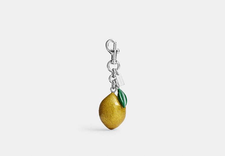 Coach Lemon Bag Charm CAO52 stock photo