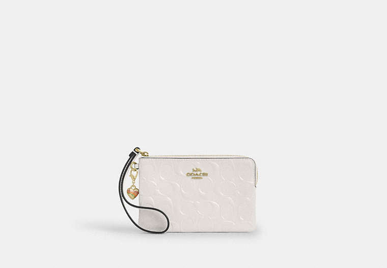 Coach CDF04 Corner Zip Wristlet Signature Leather Heart Charm Chalk stock photo