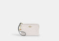 Coach CDF04 Corner Zip Wristlet Signature Leather Heart Charm Chalk stock photo