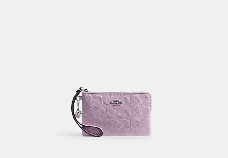 Coach CDF04 Corner Zip Wristlet Heart Charm Light Violet stock photo