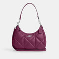 Coach Teri Hobo Bag With Puffy Diamond Quilting in Deep Berry - stock photo