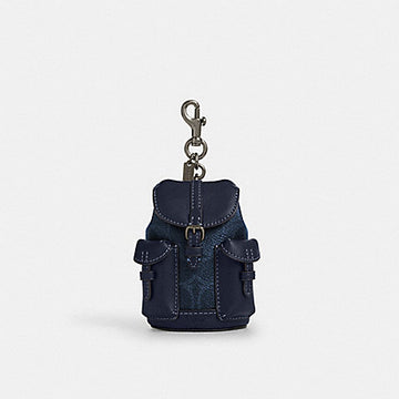 Coach Mini Warner Backpack Bag Charm In Signature Canvas CBK66 Gunmetal Denim Midnight Navy stock photo