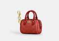Coach Mini Rowan Bag Charm CX068 crimson stock photo