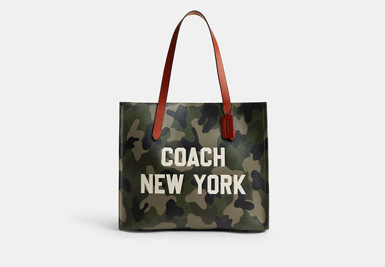 Coach Relay Tote with camo print and Coach New York graphic CY808 stock photo