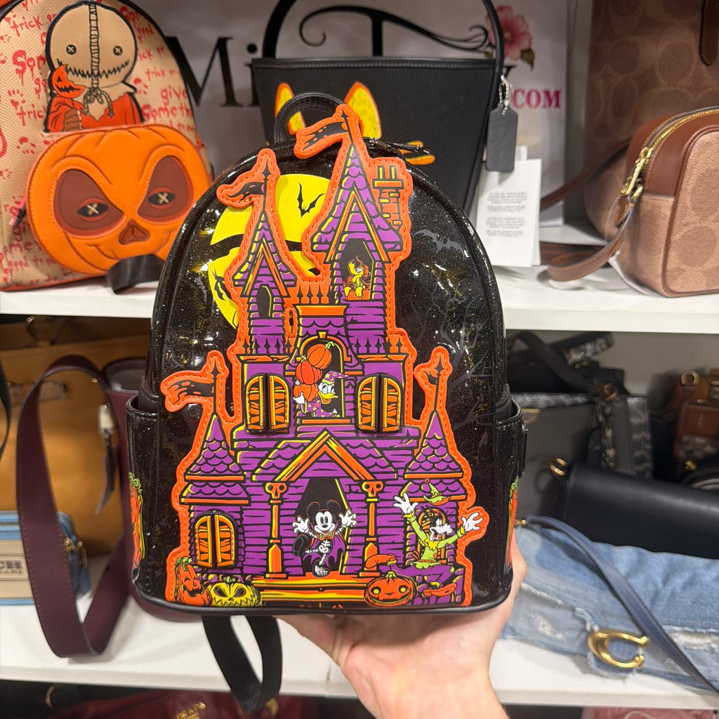 Actual item front with haunted house