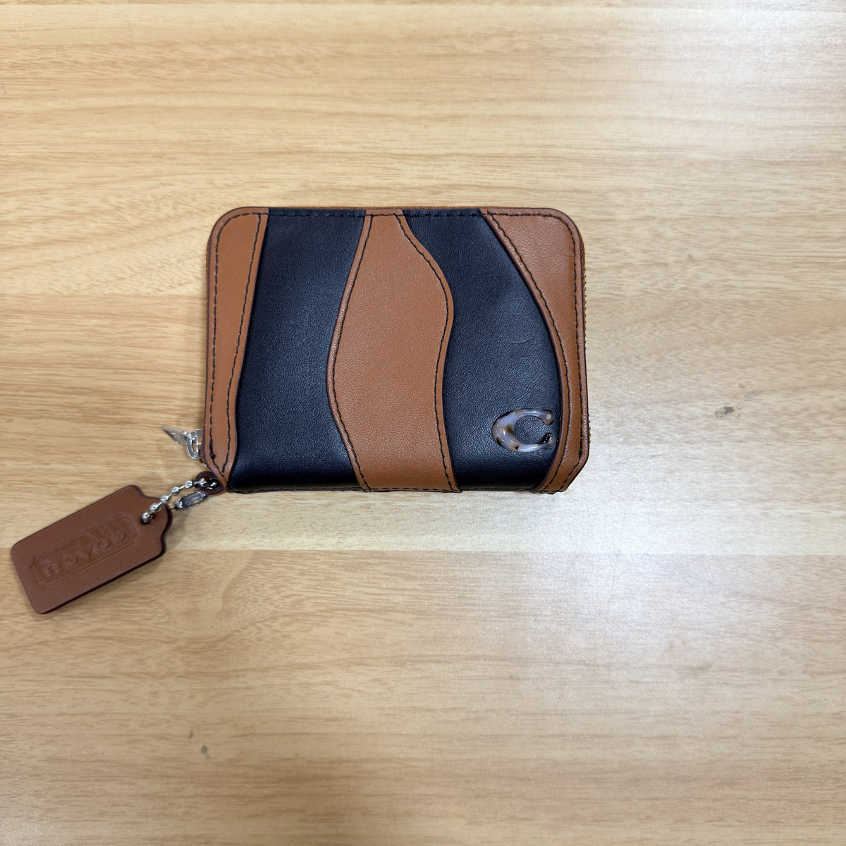 Coachtopia CQ865 wavy stripe zip around wallet black saddle front