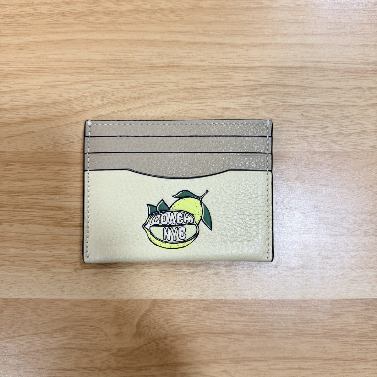 Coach lemon graphic slim ID card case front