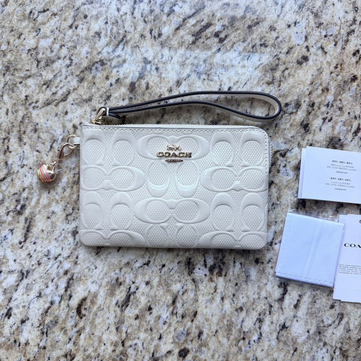 Coach CDF04 Chalk wristlet front with tags and dust cloth