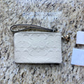 Coach CDF04 Chalk wristlet back view