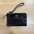 Coach black patent corner zip wristlet front