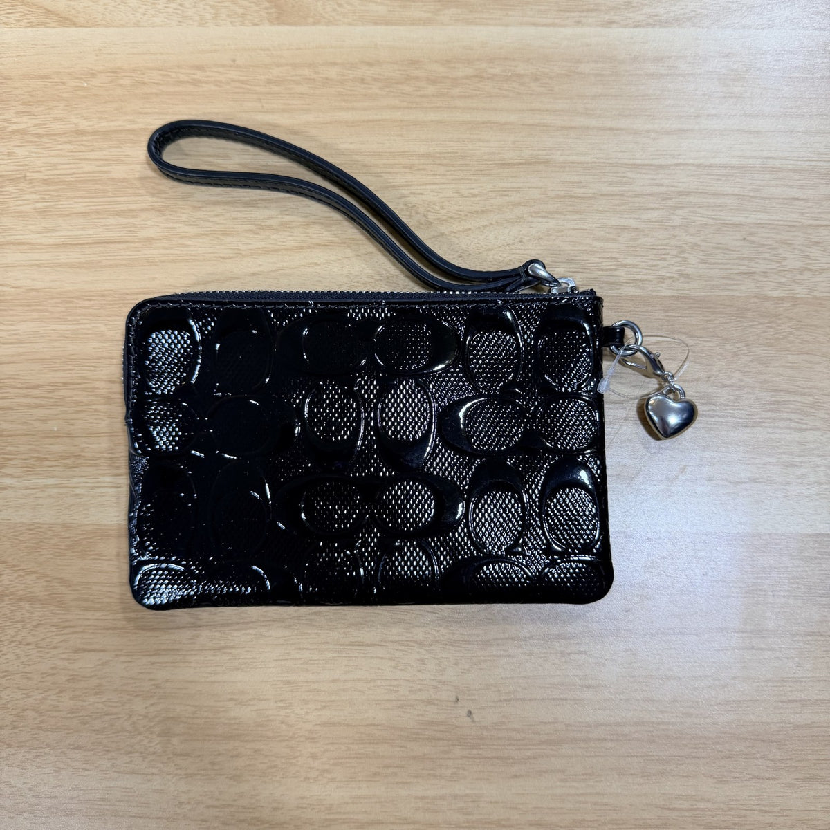 Coach black patent corner zip wristlet back