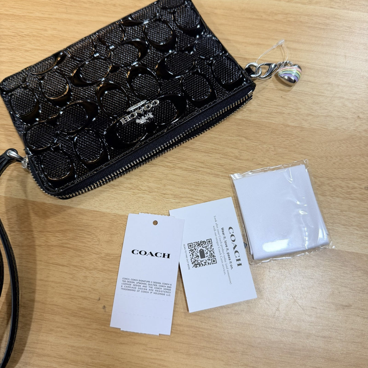 Coach black patent wristlet with hangtag, care card and dust cloth