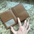 Michael Kors passport wallet back