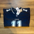 Nike Cowboys Parsons #11 navy jersey folded with NFL hangtags attached